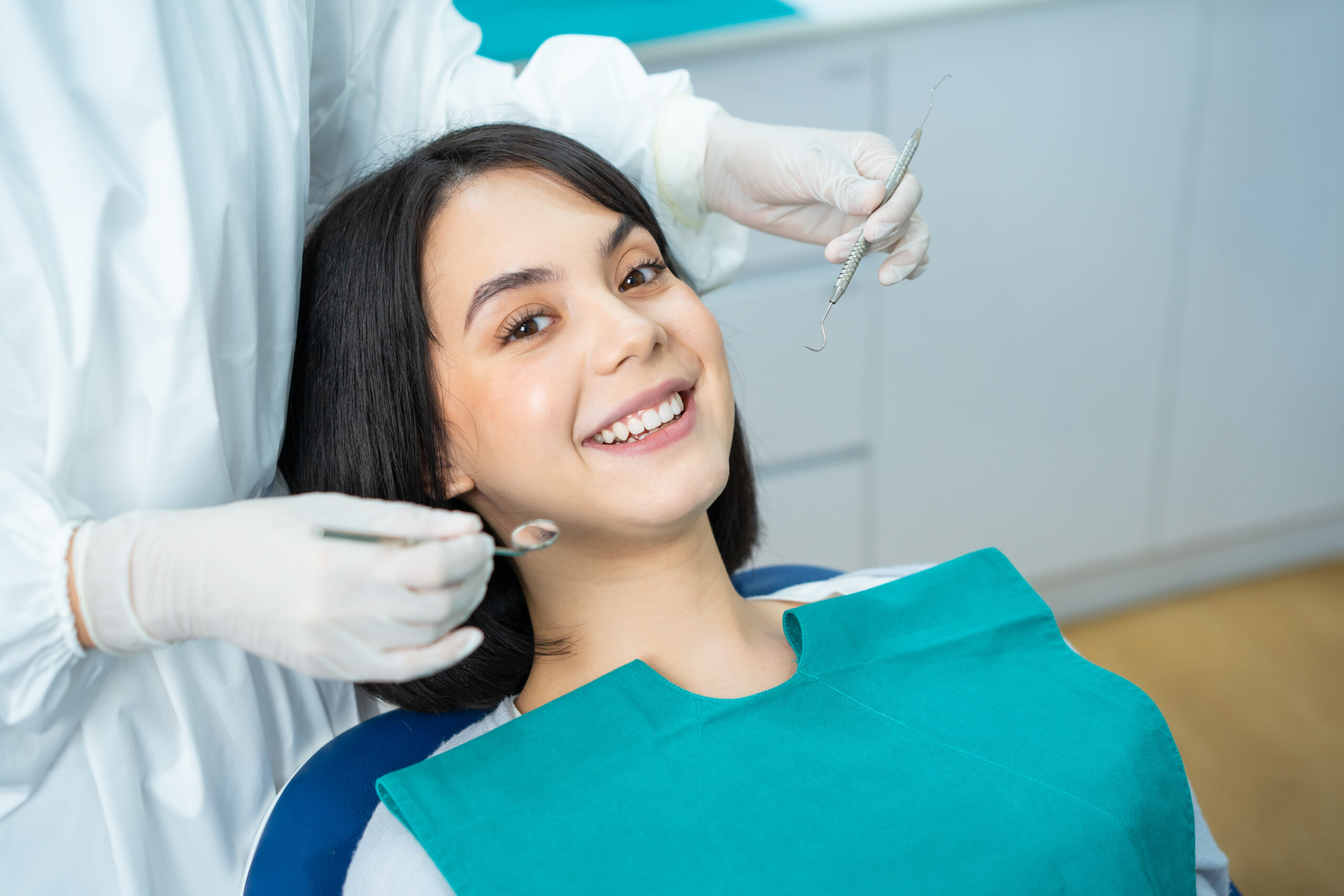 Portrait of Caucasian girl patient smiling ready for oral care checkup